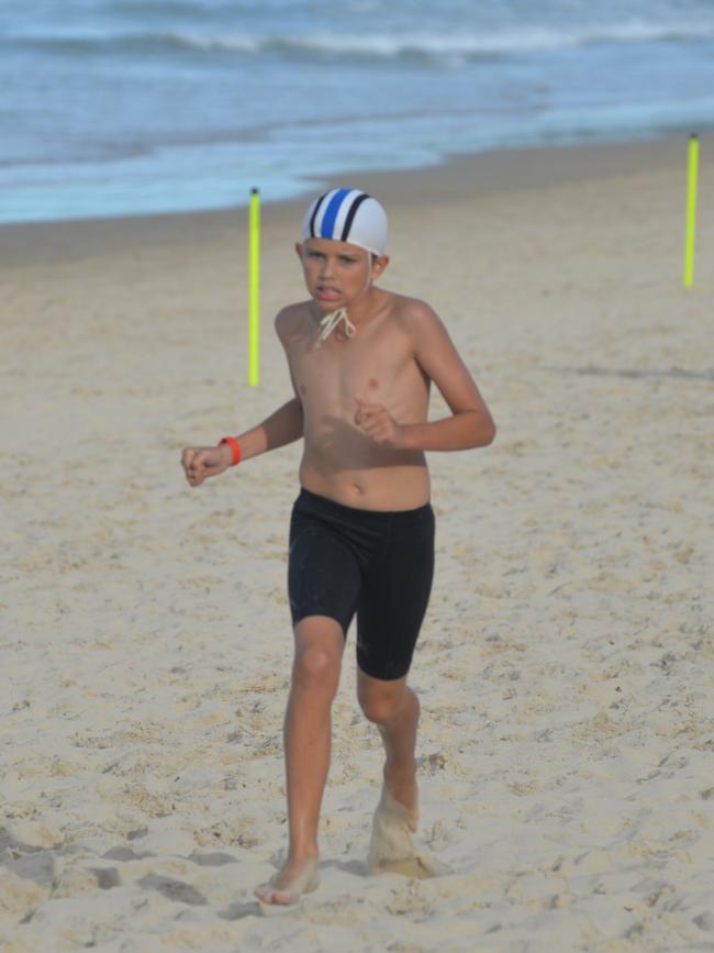 Running action at the Queensland Youth Surf Life Saving Championships on February 17.