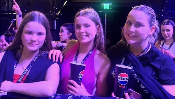 Emily, Chloe, and Imogen McAloon at the Olivia Rodrigo concert in Melbourne after shelling out a second time for tickets.