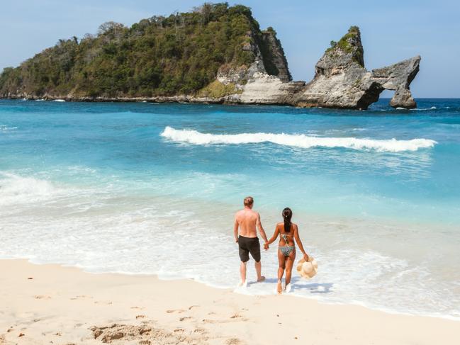 Adult couple at Atuh beach, Nusa Penida, Bali, Indonesia