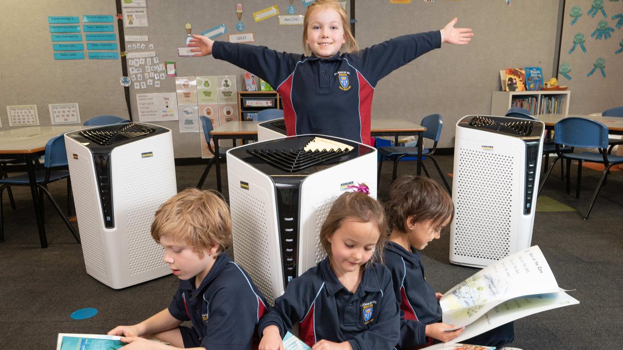 Students from St Joan of Arc Primary with purifiers donated by Karcher, in late 2021. Picture: Tony Gough