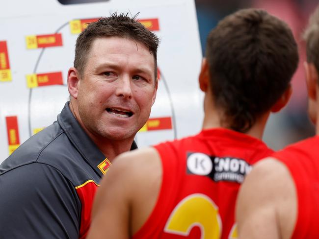 Embattled Suns coach Stuart Dew wants to have a positive ‘influence’ on his players. Picture: Michael Willson/AFL Photos via Getty Images