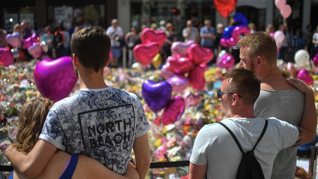 Flowers and balloons are left in Saint Ann's Square in tribute to those killed in the explosion at the Manchester Arena. Picture: Anthony Devlin / Getty Images.
