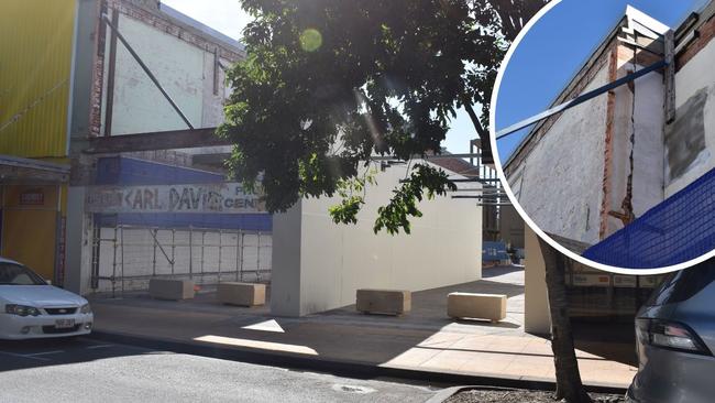 Cracks can be seen in the wall of the former Chemist Warehouse building neighbouring the East Street walkway.