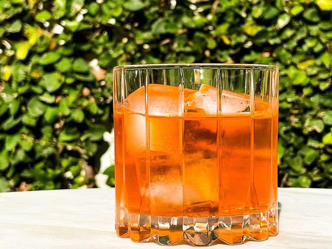 Relax into spring evenings with the Aperol negroni cocktail.