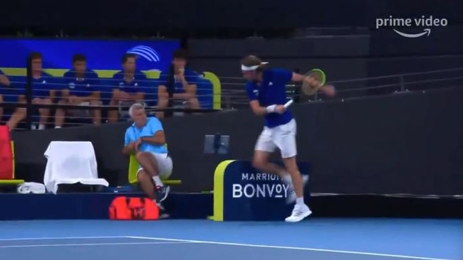 Stefanos Tsitsipas cracks his racquet and hits his dad in the process. Picture: Channel 9