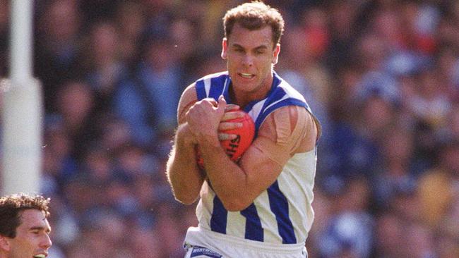 Wayne Carey in action for North Melbourne during the 1999 Grand Final.