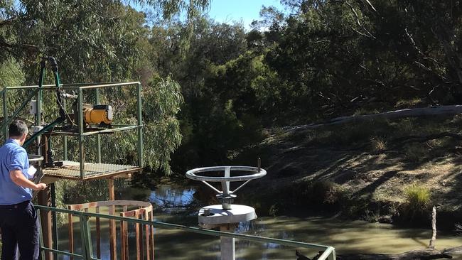 NRAR staff checking a pump. Picture: NRAR