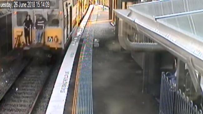 Two males buffering on a train which leaves Belmore station on June 26. Picture: Transport for NSW