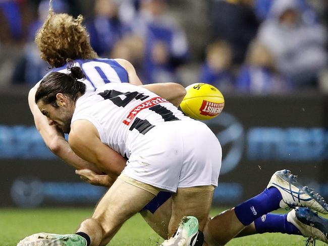 Brodie Grundy tackles Ben Brown as the pair fall to ground. Picture: Getty Images