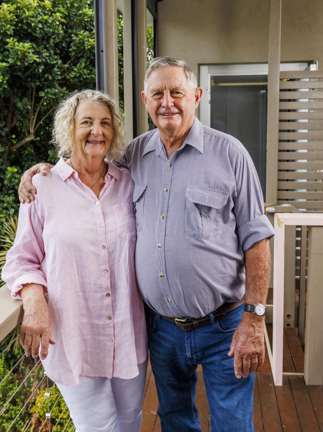 Happy days: Richard and Lyn Atkinson with their newly installed lift at their Brisbane home. Picture: Glenn Hunt