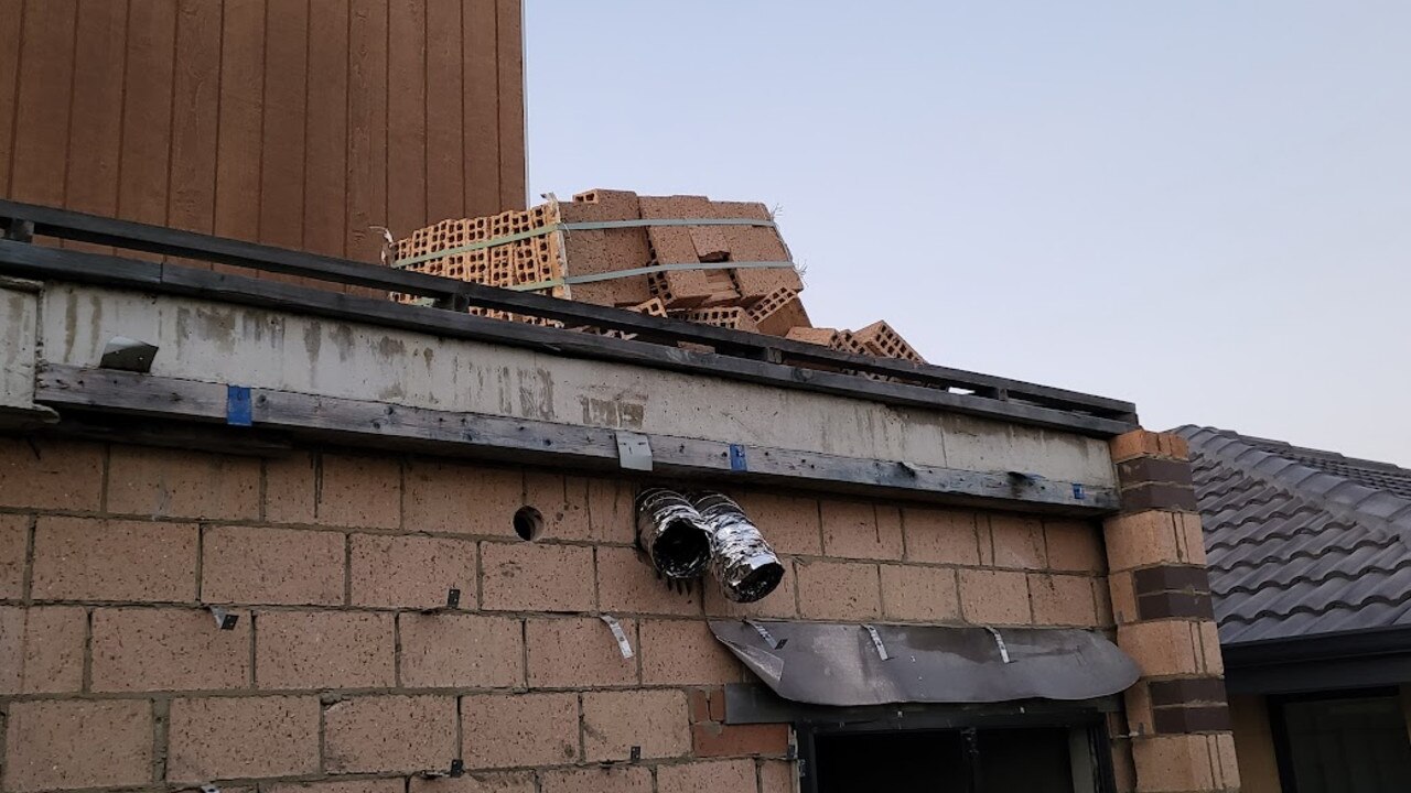 This pile of bricks on the roof was tipped over.