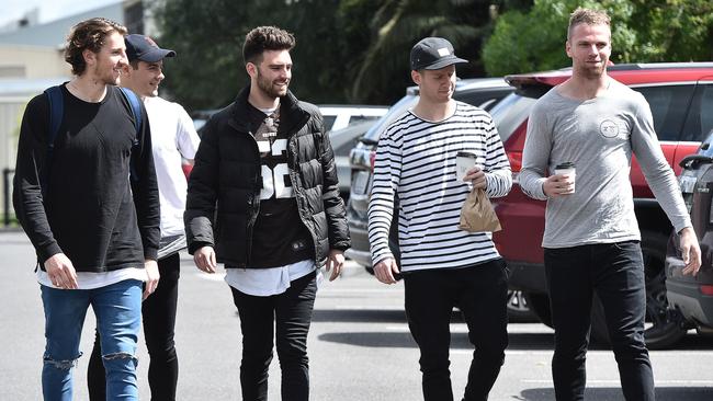 (From left) Marcus Bontempelli, Josh Dunkley, property steward Jayden O'Shea, Lachie Hunter and Jake Stringer arrive at Whitten Oval on Sunday.