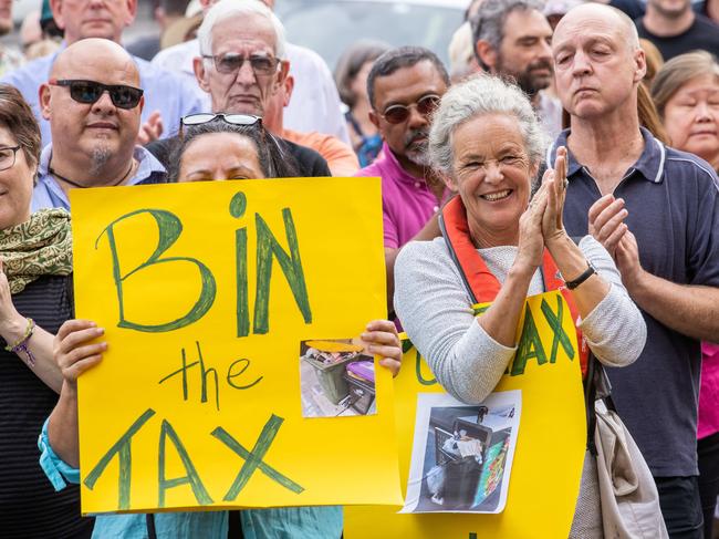 Residents protested outside Richmond Town Hall last year to rally against the introduction of a bin tax. Picture: Jason Edwards