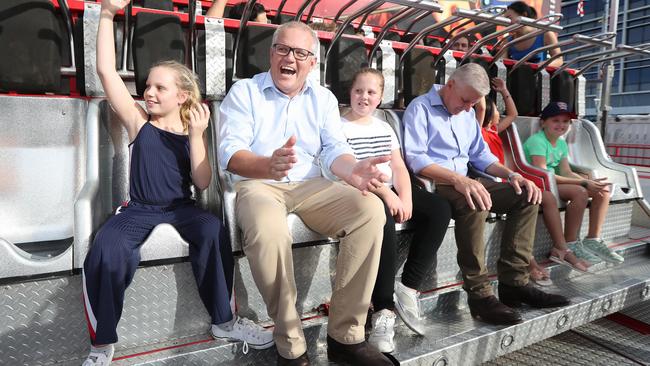 PM Scott Morrison with his and daughters Abigail and Lilly and Deputy PM Michael McCormack at the Royal Easter Show in Sydney. Picture: Gary Ramage