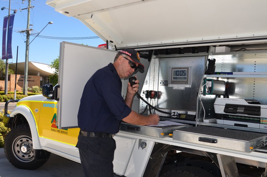 NEW COMMAND: Rural Fire Service Warwick Group Deputy Officer Malcolm Stacey demonstrates the command and communications capacity of the new Warwick 91 command vehicle. Photo Jayden Brown / Warwick Daily News. Picture: Jayden Brown