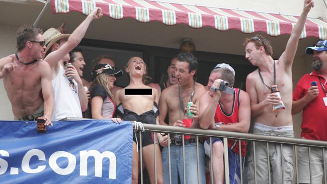 Flashback: A flasher on a balcony at the 2004 Gold Coast race weekend. Picture: Mike Batterham.