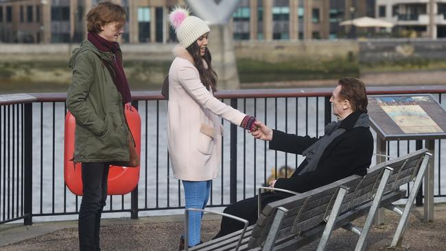 Liam Neeson, Thomas Brodie-Sangster and Olivia Olson seen filming a Love Actually sequel. Picture: FameFlynet/BackGrid