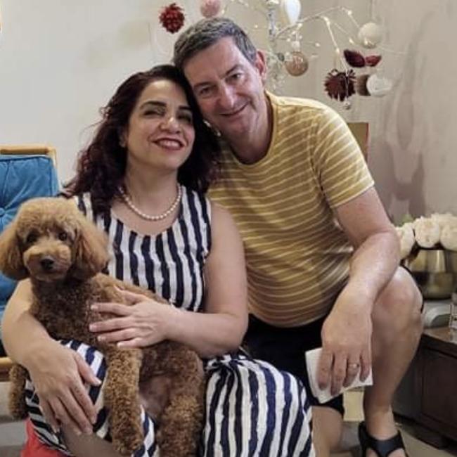 Simin Kashi, Neil Ivett, and their dog Sherlock, 3. Picture: Supplied.