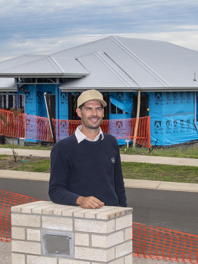 Jackson Adams of Richard Adams Homes in Cotswold Hills, Tallowwood Boulevard at one of the 35 builds the company currently has on the go. Picture: Nev Madsen