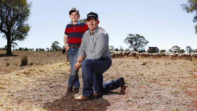 Farmer Peter Campbell with his son Nicholas on their property outside Merriwa in north west NSW. They are currently experiencing drought conditions with no decent rain for months. Picture: Richard Dobson