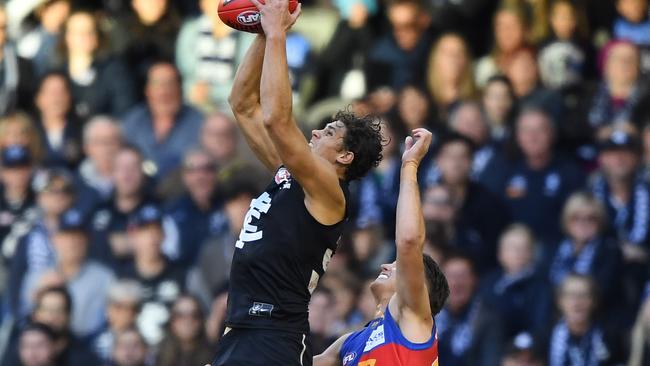 A fan was ejected from Carlton’s game against Brisbane on Saturday for calling umpire Mathew Nicholls a ‘bald headed flog’. Picture: AAP Image/Julian Smith.