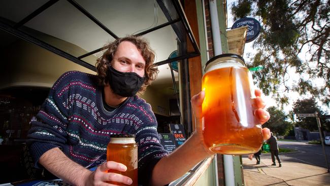 The Union Hotel in Brunswick has been serving up locals but is ready to open its doors again. Matthew Cuthbertson serves up some jars of ale earlier this year. Picture: Mark Stewart