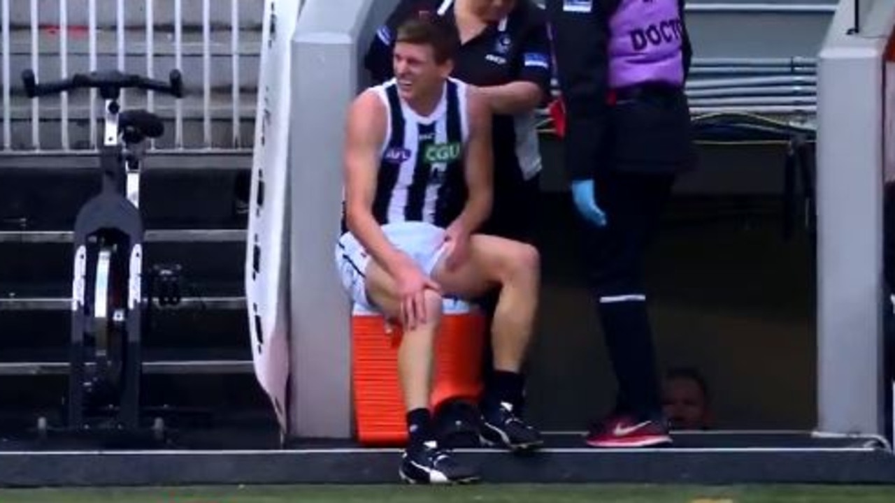 Collingwood's Will Hoskin-Elliott after appearing to hurt his knee.