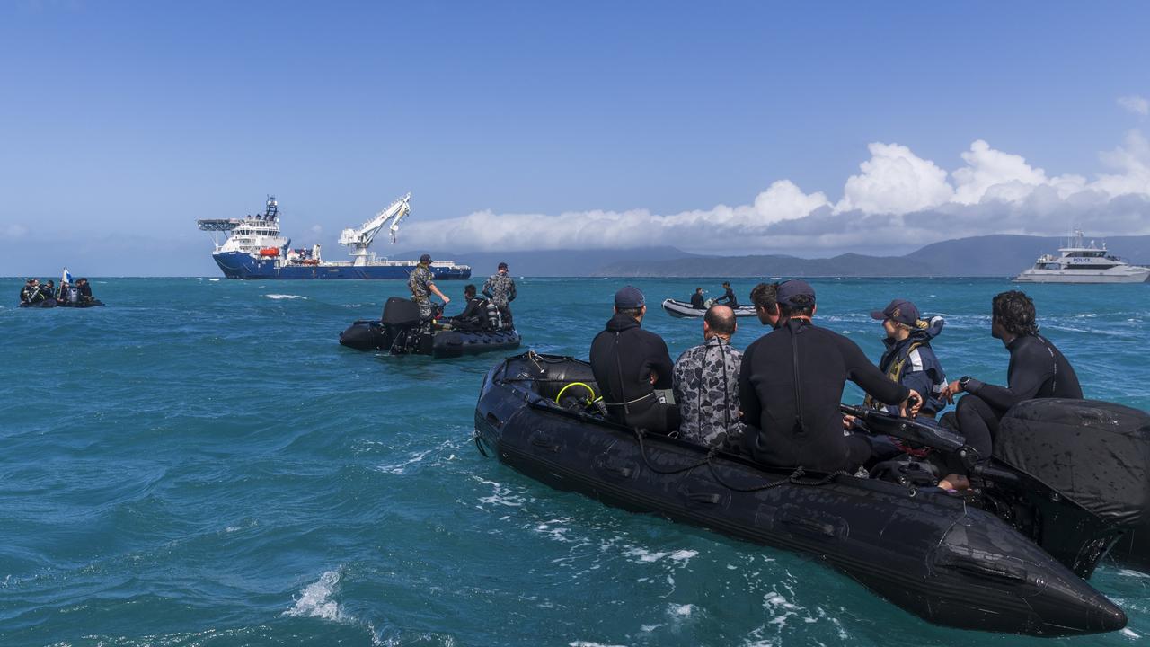 Royal Australian Navy Clearance Divers and Queensland Police Service during a recovery mission in August 2023.