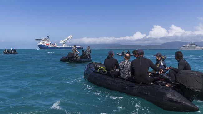 Royal Australian Navy Clearance Divers and Queensland Police Service during a recovery mission in August 2023.