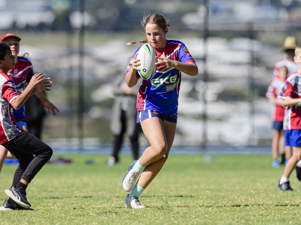 Macey McKellar keeps possession for Highfields State School in the inaugural Primary Interschools Reconciliation Touch Carnival hosted by Glenvale State School, Wednesday, May 28, 2025. Picture: Kevin Farmer