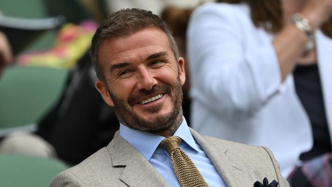 Former England footballer David Beckham sits on Centre Court to watch the Men's singles tennis matches on the first day of the 2024 Wimbledon Championships at The All England Lawn Tennis and Croquet Club in Wimbledon, southwest London, on July 1, 2024. (Photo by Glyn KIRK / AFP) / RESTRICTED TO EDITORIAL USE