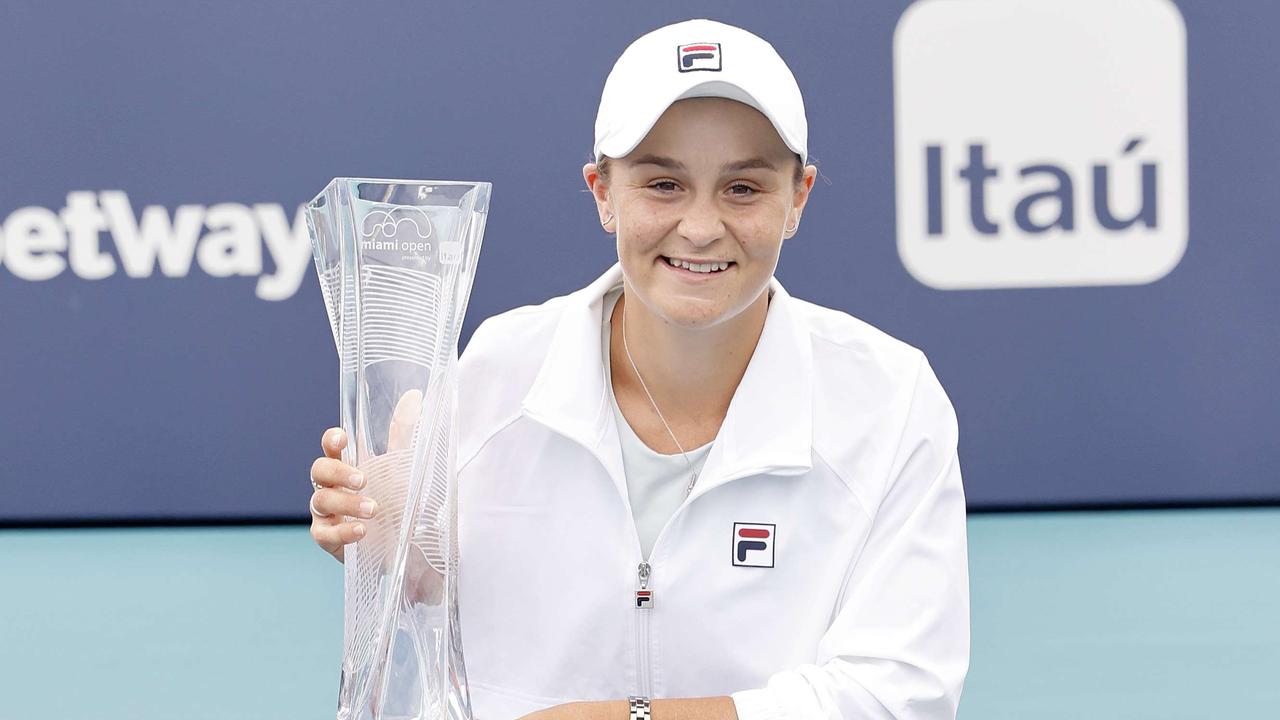 Ash Barty poses with the winner's trophy after defeating Bianca Andreescu of Canada during the final of the Miami Open at Hard Rock Stadium on April 03, 2021.