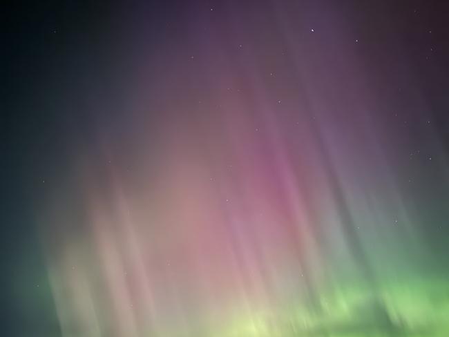 Photos of Aurora Australis taken across Tasmania. Boomer Bay looking southeast. Picture: Bruce Levett