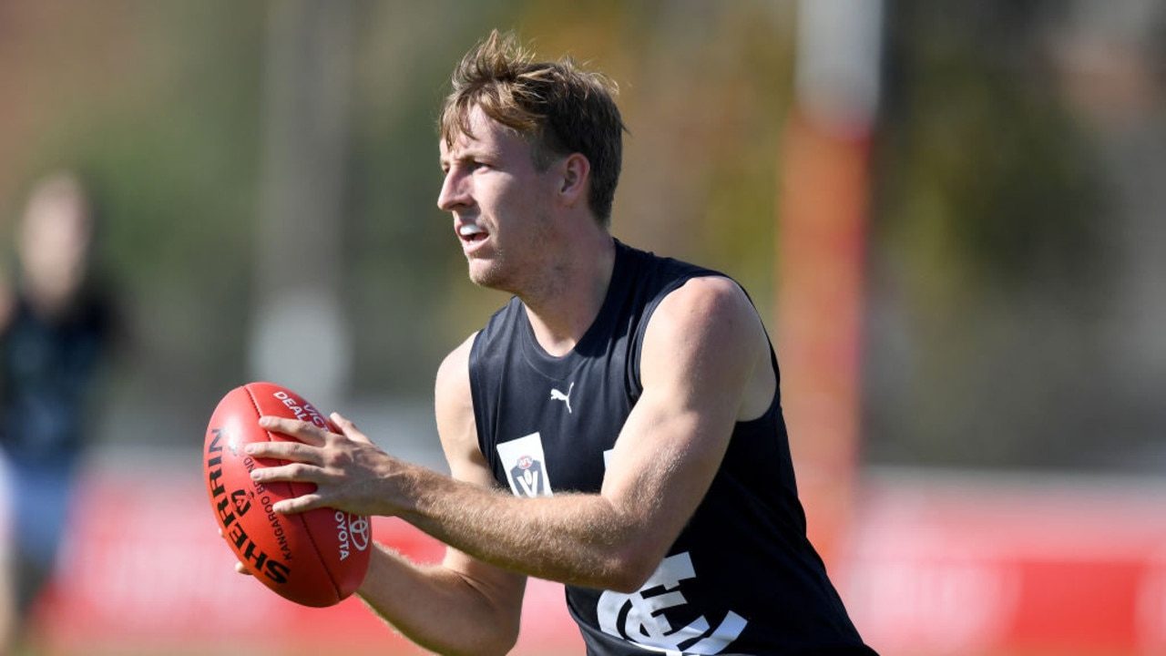 MELBOURNE, AUSTRALIA - MAY 02: Will Setterfield of Carlton takes possession of the ball during the round three VFL match between Essendon Bombers and Carlton Blues at Windy Hill on May 2, 2021 in Melbourne, Australia. (Photo by Morgan Hancock/AFL Photos/via Getty Images)