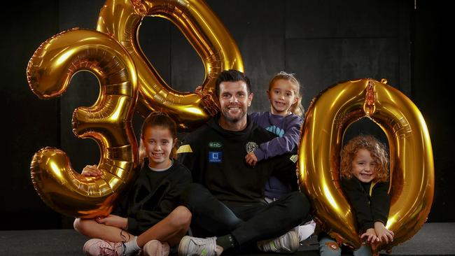 Trent Cotchin with his children Harper (left), Mackenzie (middle) and Parker (right) before his 300th game. Picture: Michael Klein.