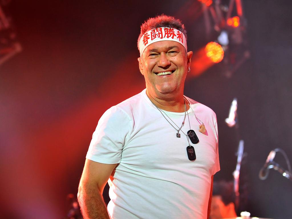 Jimmy Barnes performs at a Cold Chisel concert.