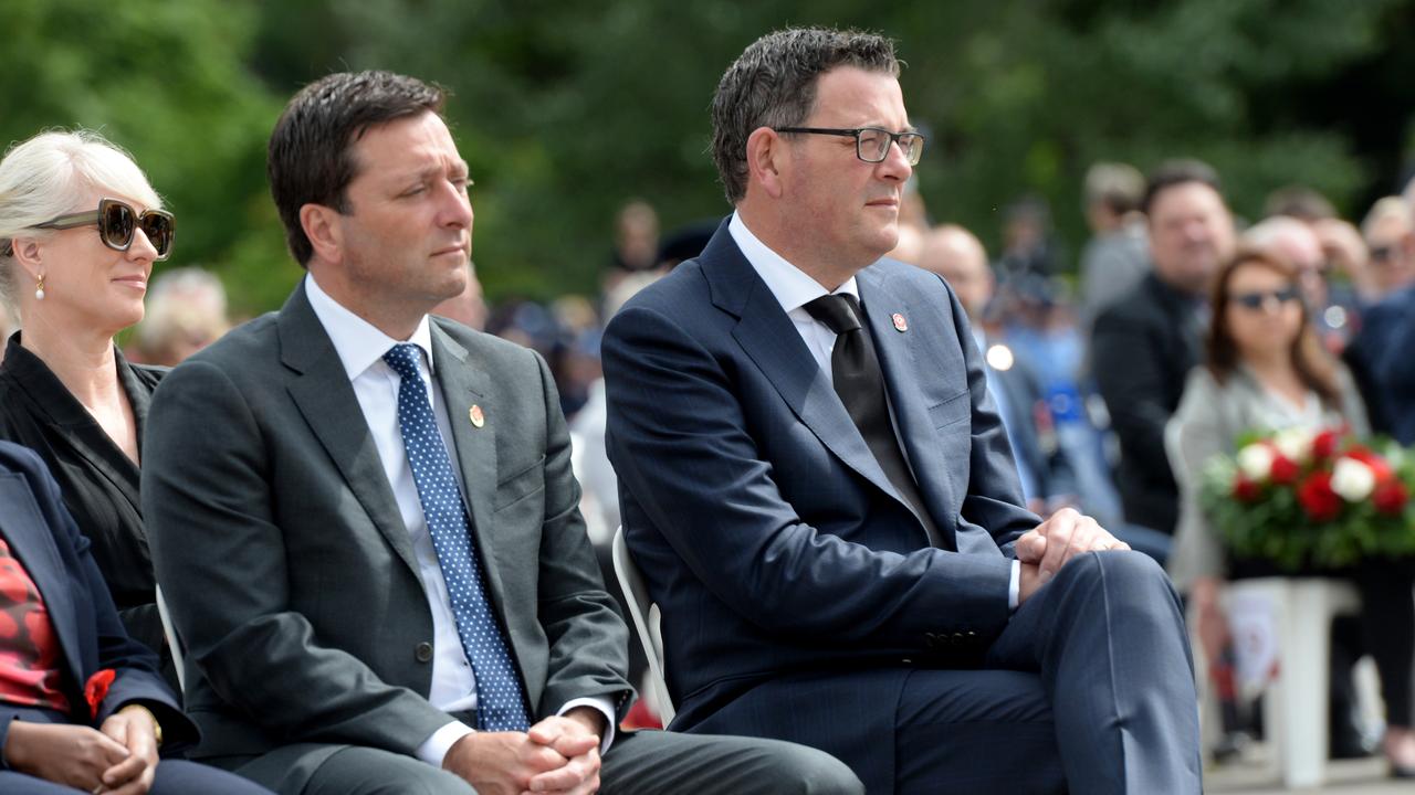 Guy alongside rival Premier Daniel Andrews. Picture: Andrew Henshaw