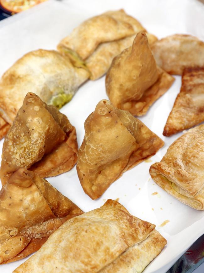 The Metro Petroleum servo’s snack offering includes samosas, chicken puffs, paneer puffs and veggie cutlets. Picture: Richard Dobson