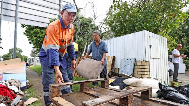 Phuc Ly cleaning in the aftermath from the flooding caused by ex Tropical Cyclone Alfred in Oxley.