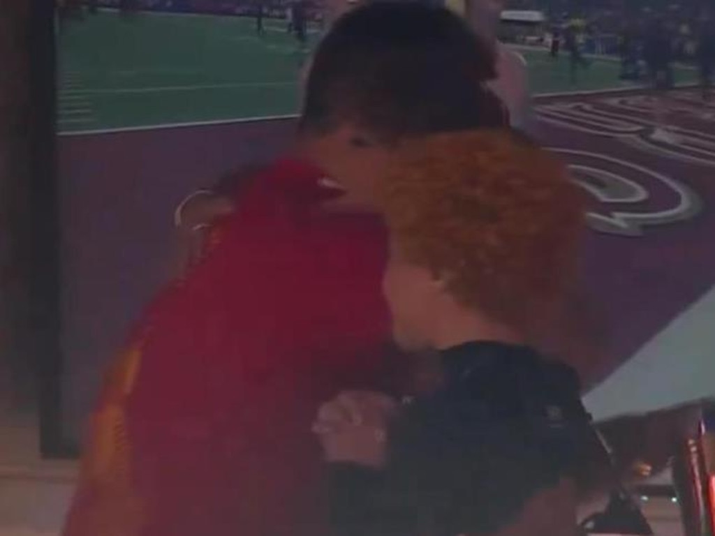 Jason Kelce, the brother of Travis Kelce, hugs Taylor Swift in the family suite. Picture: CBS/X