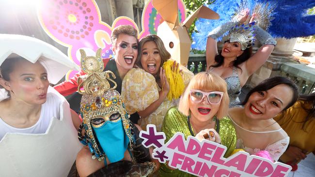 Heather Croall with Fringe ambassadors Reuben Kaye and Diana Nguyen and Fringe performers at the Adelaide Fringe 2022 program official launch. Picture: Kelly Barnes