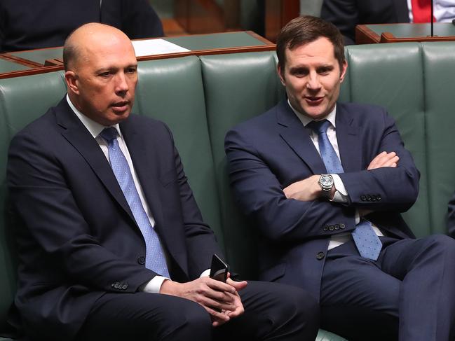 Peter Dutton and Alex Hawke in the House of Representatives on Wednesday. Picture: Kym Smith