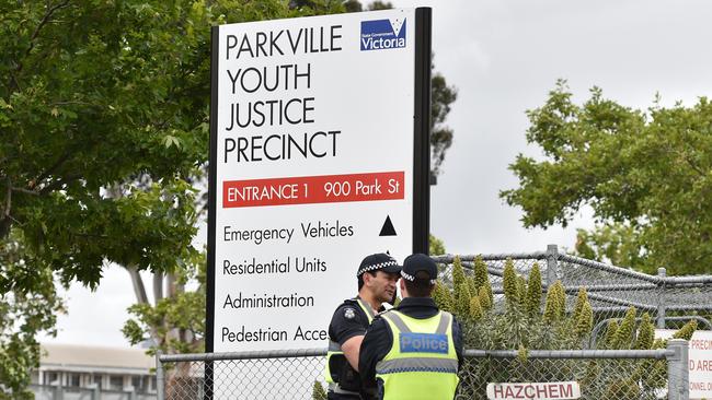 An officer has been bashed by up to seven teenage inmates at the Parkville Youth Justice Centre.