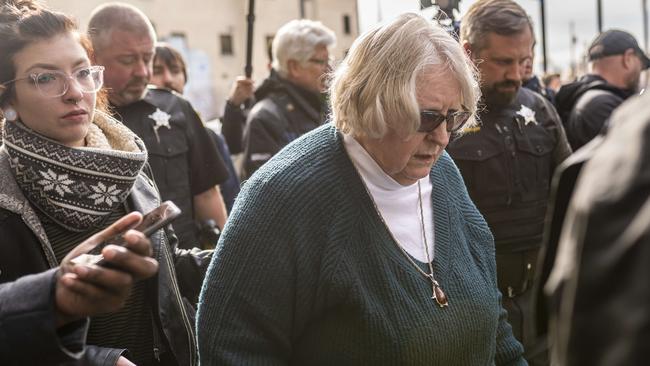 Susan Hughes (C), Anthony Huber's great aunt, and Hubers girlfriend Hannah Gittings, (L), leave the Kenosha County Courthouse after hearing a not guilty verdict. Picture: Getty Images.