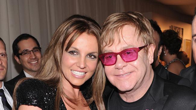 WEST HOLLYWOOD, CA - FEBRUARY 24: (L-R) Recording Artist Britney Spears and Sir Elton John attend the 21st Annual Elton John AIDS Foundation Academy Awards Viewing Party at West Hollywood Park on February 24, 2013 in West Hollywood, California. (Photo by Jamie McCarthy/Getty Images for EJAF)