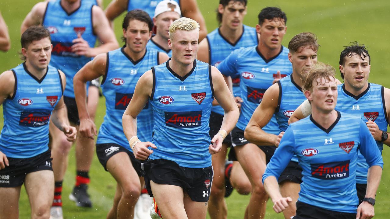 Nik Cox hits the training track with fellow Essendon youngsters. Picture: Getty Images