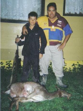 Lionel Patea with his dad after a hunting trip.