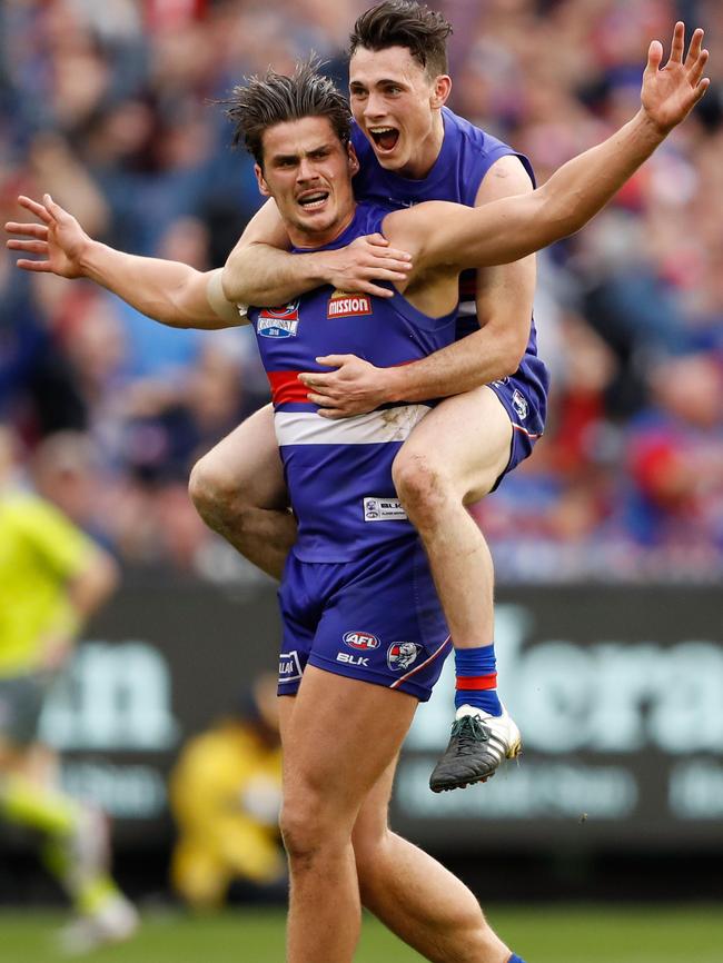 Tom Boyd and Toby McLean celebrate a goal.