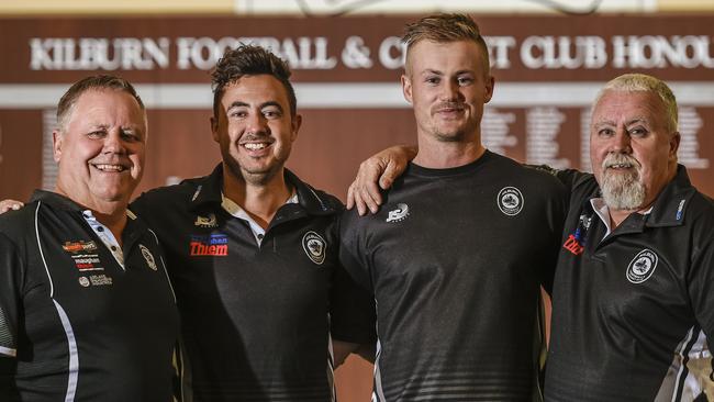 Kilburn Football Club financial director Danny Parks (left), players Billy and Kyle and former player John Parks. The Parks family is urging the community to get behind the club as it struggles through debt. Picture: AAP/Roy Vandervegt