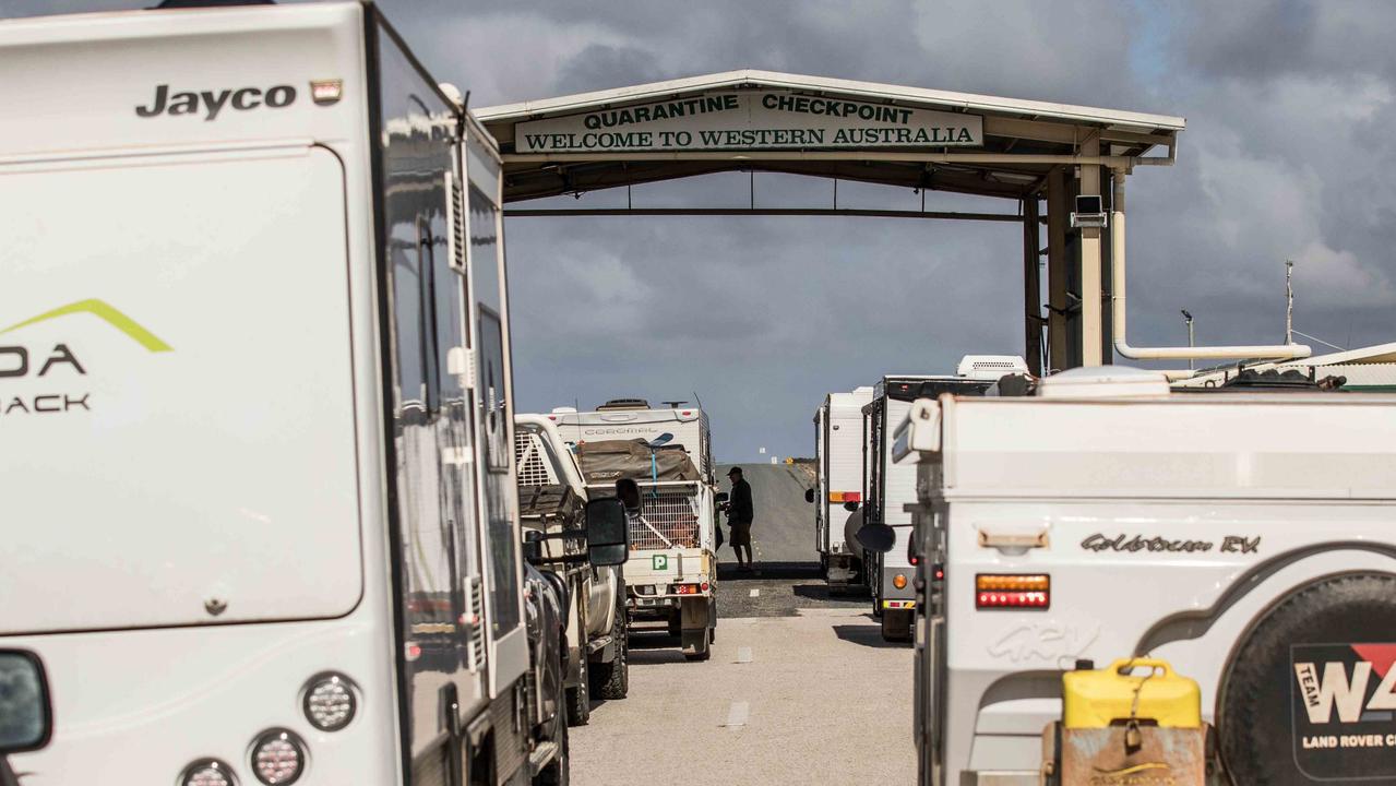 Queues to enter Western Australia yesterday before the strict entry requirements came into place.
